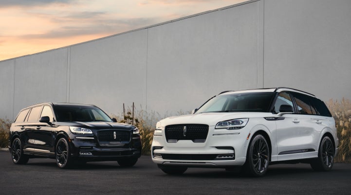 Two Lincoln Aviator® SUVs are shown with the available Jet Appearance Package | Palmetto Lincoln in Charleston SC