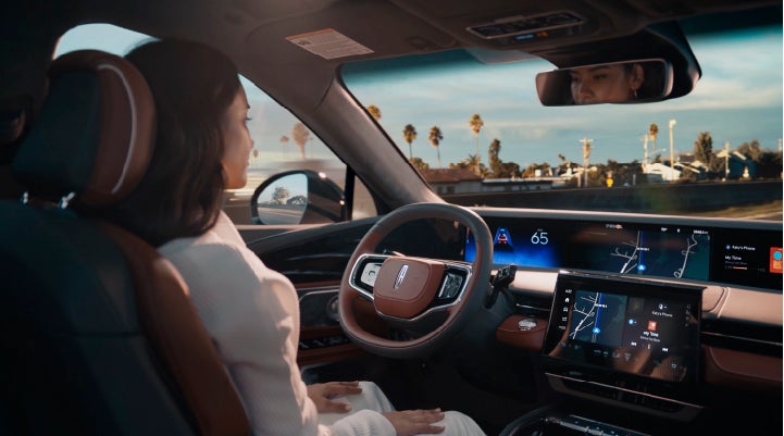 A person is shown driving hands-free on the highway with available Lincoln BlueCruise technology. | Palmetto Lincoln in Charleston SC