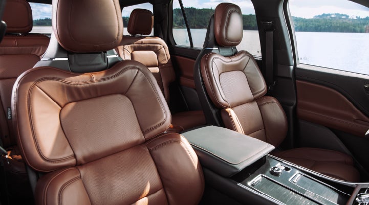 The front row's Perfect Position Seats in a 2024 Lincoln Aviator® Reserve model with Ebony Roast interior | Palmetto Lincoln in Charleston SC