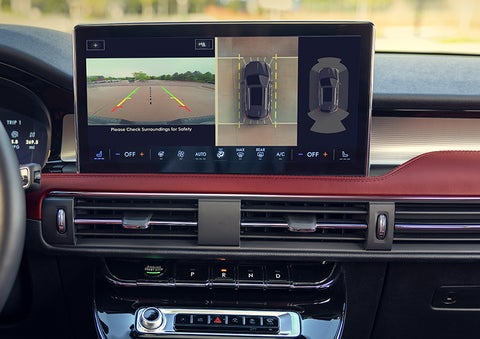The driver of a 2024 Lincoln Corsair® SUV is shown selecting the drive mode. | Palmetto Lincoln in Charleston SC